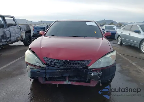 2003 Toyota Camry Le z USA, uszkodzony, nr VIN 4T1BE32K33U203726